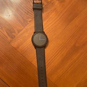 Men’s black Movado  Bold watch. Need battery. Black rubber band. Slightly used.
